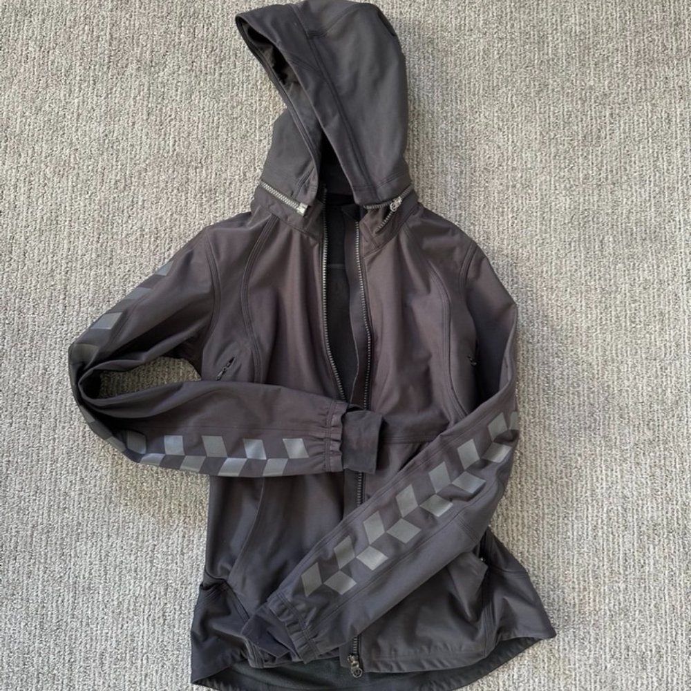 Lululemon Softshell Hooded Jacket with reflective pattern on sleeves